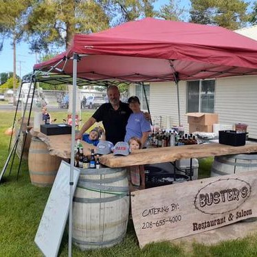 A picture of Busters Staff at a remote site catering food for an event.